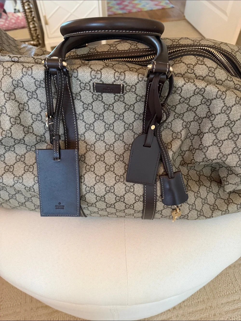 Authentic Gucci Beige Brown GG Supreme Rolling Duffel with Dark Brown Trim